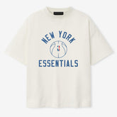 New York Knicks Fear of God x Barkley L. Hendricks Unisex 90's T-Shirt - Cream sale