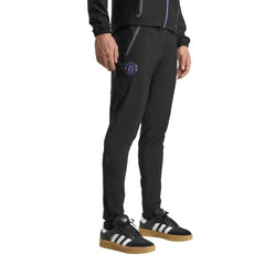 Manchester United 2025/26 Tiro Vis Tech AEROREADY Travel Pants - Black for sale