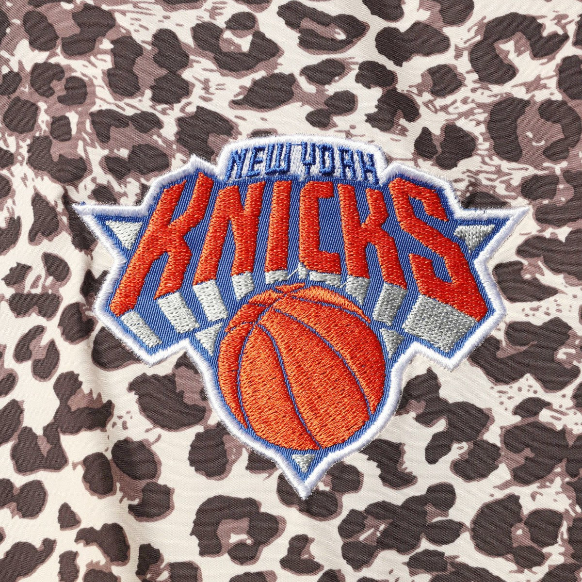 New York Knicks DKNY Sport Women's Gabriella Windbreaker Half-Zip Hoodie - Leopard sale
