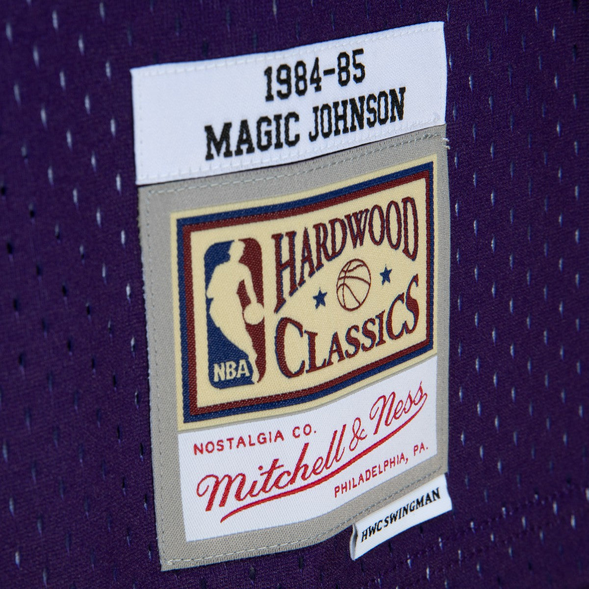 Magic Johnson Los Angeles Lakers 1984/85 Hardwood Classics Fadeaway Swingman Player Jersey - Purple/Black for sale