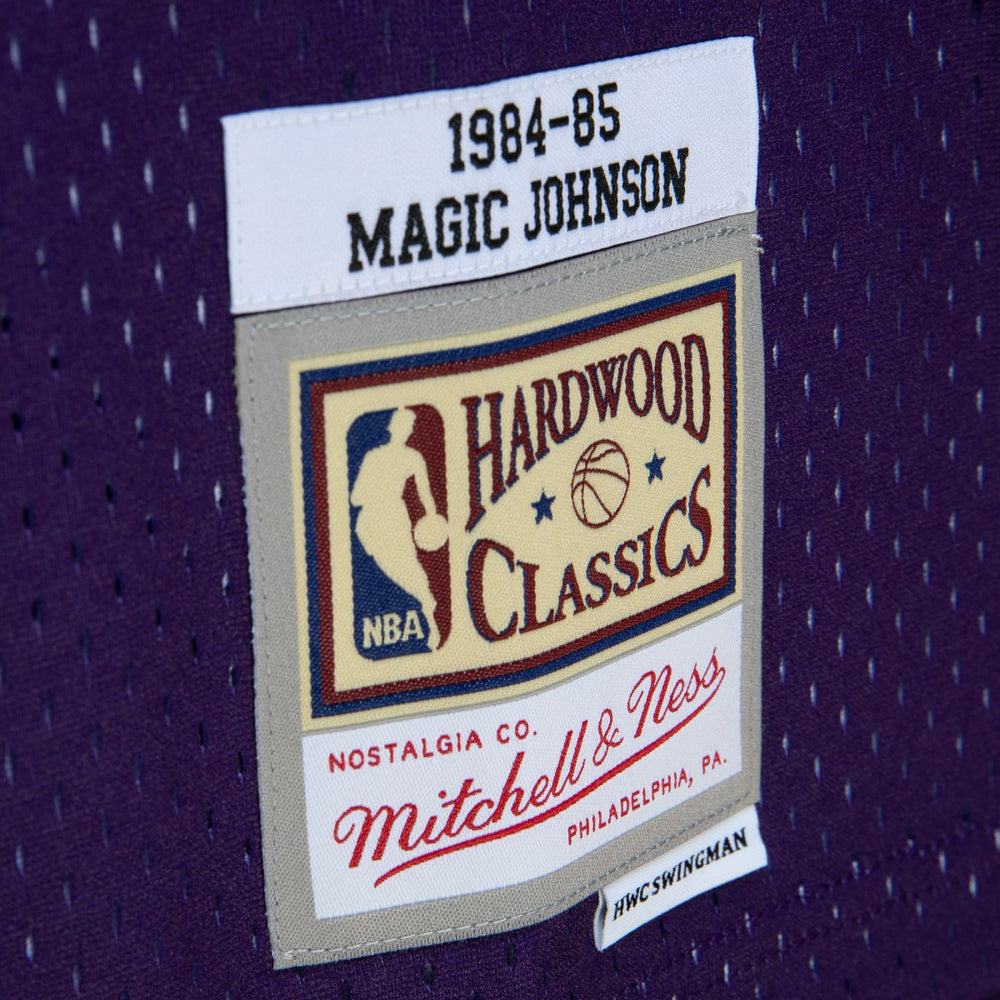 Magic Johnson Los Angeles Lakers 1984/85 Hardwood Classics Fadeaway Swingman Player Jersey - Purple/Black for sale